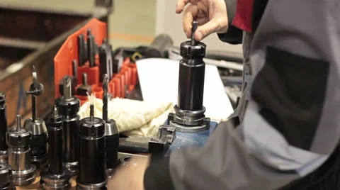 Close-up mechanical industrial worker measuring detail in tool workshop. 스톡 동영상 60235568