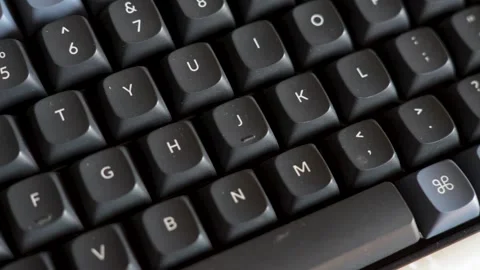 Close-up of Mechanical Keyboard with Red Enter Key. High-angle macro shot o.. 스톡 동영상 330424876