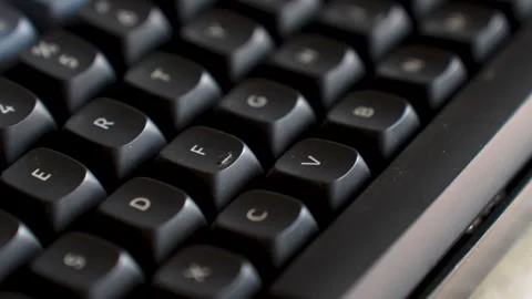 Close-up of Mechanical Keyboard with Red Enter Key. High-angle macro shot o.. Stock Footage 330424892
