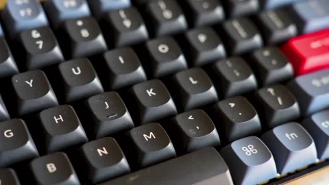 Close-up of Mechanical Keyboard with Red Enter Key. High-angle macro shot o.. 스톡 동영상 330424908