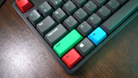 Close up of a mechanical keyboard on a wooden table Stock Footage 161326023