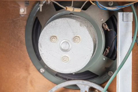 Close-up of a mechanical part within an old tube radio, dominated by indust.. Stock Photos