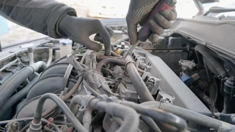 Close-up of a mechanics gloved hands using a screwdriver to repair and maintain 스톡 동영상 329285006