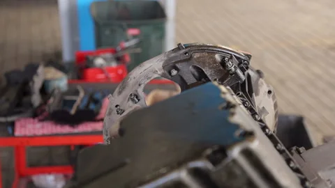 Close-up of the mechanic's hands, he repairs the engine in the car. Stock Footage 120105868