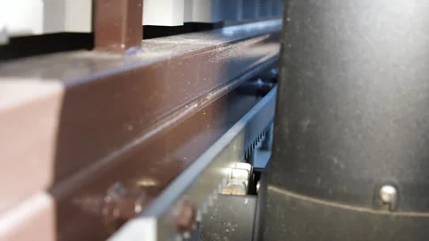 Close-up of mechanism of opening metal automatic gate. Moving gears driving gate Stock Footage 267717576