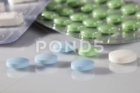 Close-up medical pills and tablets background Stock Photos