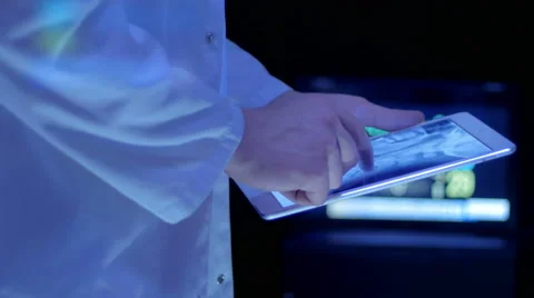 Close-up of medical trainee examining an image of head and neck Stock Footage 67262357