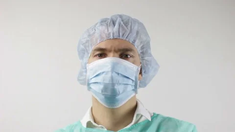 Close Up of Medical Worker Looking into the Camera Stock Footage 102522698