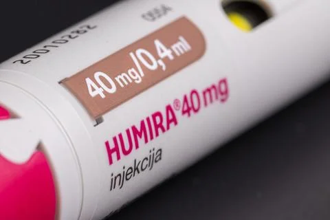 Close-Up of Medication Injector Featuring Dosage Information Stock Photos
