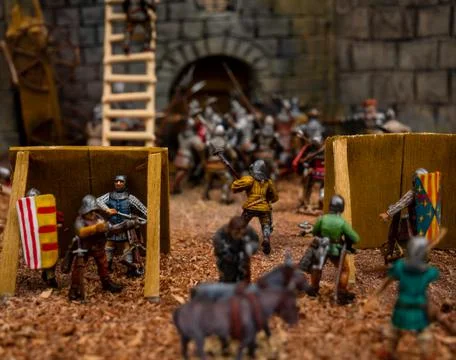 Close up medieval diorama assault on the castle frontal siege Stock Photos