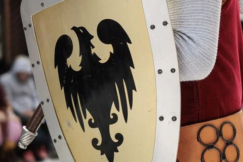 Close Up of Medieval Shield with Heraldic Eagle and Period Costume in Alcoy Фото