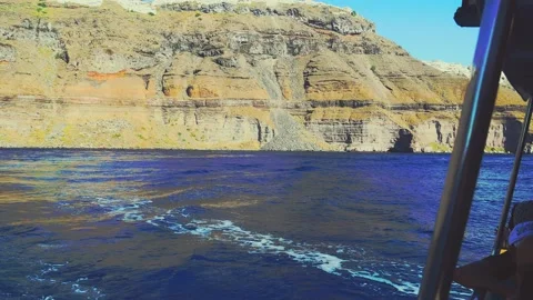 Close-up on the Mediterranean Ocean with Steep Volcanic Mountain Cliffs in th Vídeo Stock 145142998