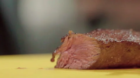 Close up Medium rare Grilled beef slicing side angle Stock-Footage 156172325