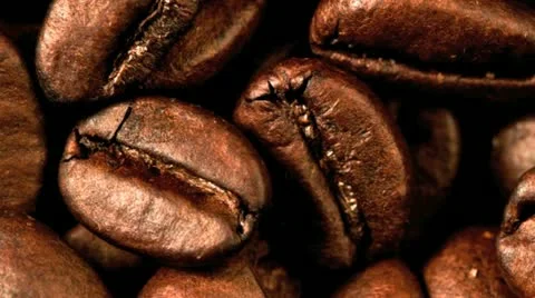 Close up of medium roasted coffee beans Vídeos de archivo 21316676