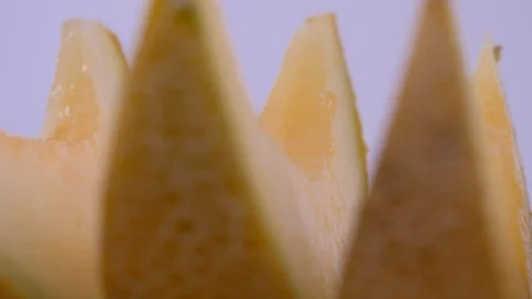Close Up  of Melon Slices Panning from Left to Right. Slices, Produce Video stock 128315692