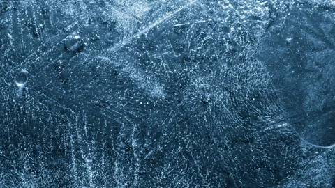 Close-up of melting ice on black background Stockbeeldmateriaal 111153984