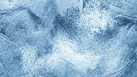 Close-up of melting ice on black background Stockbeeldmateriaal 111174784