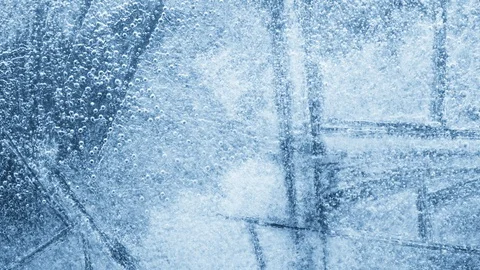 Close-up of melting ice on black background 스톡 동영상 125577568