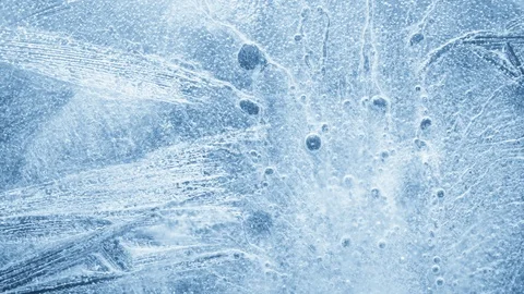 Close-up of melting ice on black background Vídeo Stock 125578764