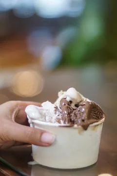 Close up melting ice cream dessert creamy indulgence bokeh background Stock Photos