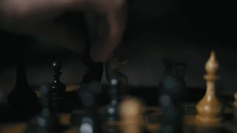 Close-Up, Men Hand Makes a Horse Ride on a Chess Board in the Night Tournament Stock Footage 113167066