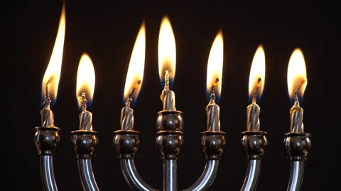 Close up of Menorah With All Candles Burning on Black Background. Hanukkah 스톡 동영상 130226818