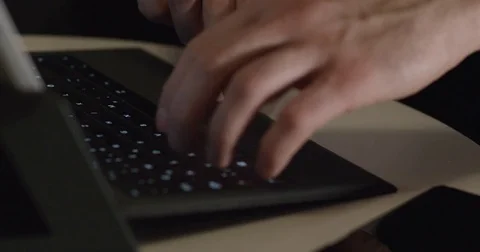 Close-Up Men's Hands Typing Text On The Laptop Keyboard Stock Footage 85219391