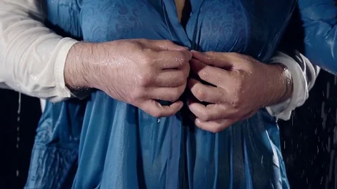 Close-up. men's hands unbutton the buttons on my shirt women. shirt lace Stock Footage