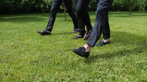 Close-up Men's steps. Slow motion. Stock Footage 172139005