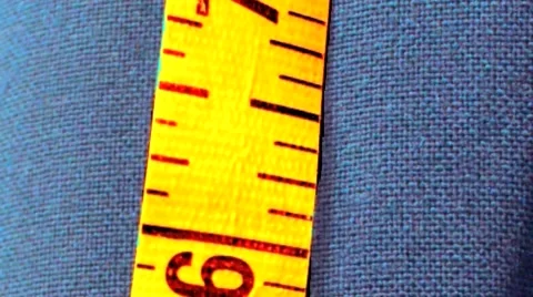 Close up of men's suit jacket and tailor's tape measure. Stock Footage 48007864