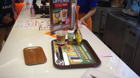 Close up menu tea &amp; acoffe after order at japanesse restaurant Stock Footage 248284427