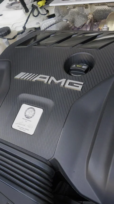 Close-up of Mercedes-Benz AMG engine with performance automotive detailing Stock Footage 346851779