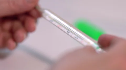 Close-up on mercury thermometer Stock Footage 125895914