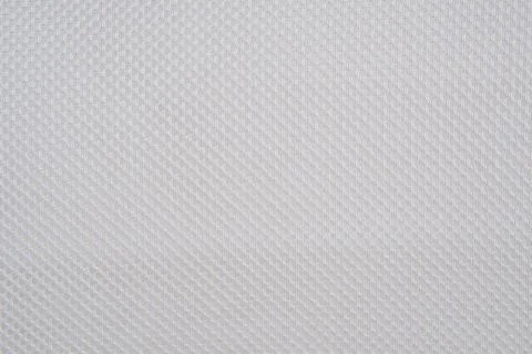 Close up of the mesh fabric pattern from the backrest of the chair. 库存照片