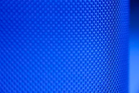 Close-up of a mesh of a sieve in blue - technical background Stock Photos