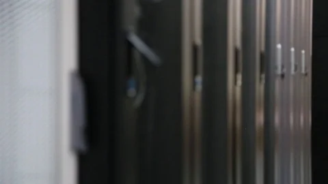 Close up meshed doors with button in server room close up with depth of field Video stock 106888680