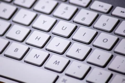 Close up to a metal computer keyboard Stock Photos