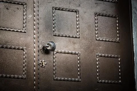 Close Up of Metal Door With Decorative Security Features Stock Photos
