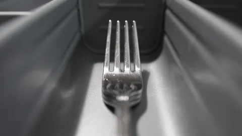 Close-up of an metal fork in a kitchen drawer Video stock 121312300