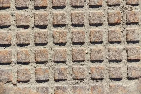 Close up metal grid pattern of manhole Stock Photos