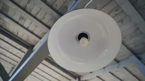 Close-up of a metal lamp hanging on the ceiling in a wooden gazebo Stock Footage 220154087