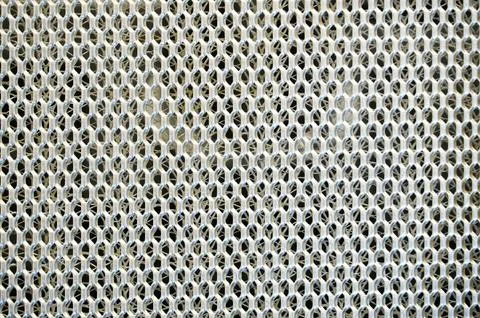 Close up of a metal mesh pattern. background and texture for design Stock Photos