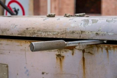 Close-up of metal operating handle on rusty machine tool Photos