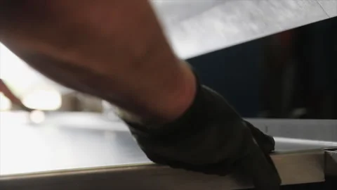 Close-up of metal panel bending process on a press brake Stock Footage 317254072