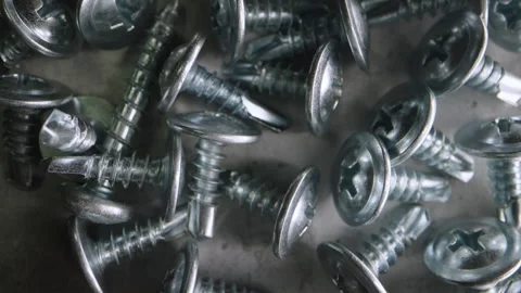 Close Up Metal Screws As Background Neutral Surface For Commercial Use Video stock 333209397