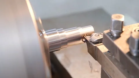 Close-up Metal Turning Process on Industrial Lathe Stock Footage 339242020