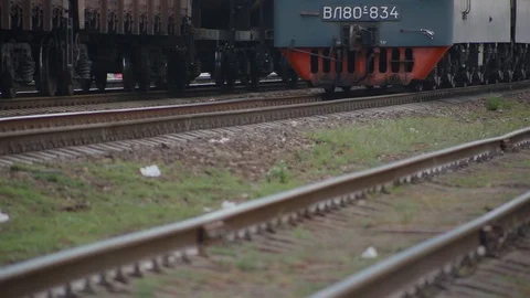 Close-up metal wheels of the train, which passes on rails of railway Video stock 117994310