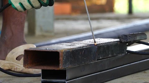 Close-up: Metal worker welding iron in a workshop  Stock Footage 123395251
