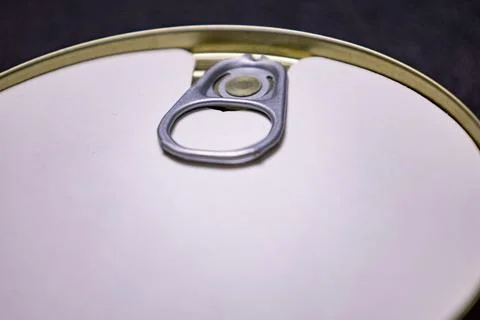 Close-up of metallic can lid with pull tab Fotos de archivo