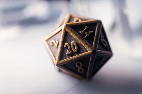 Close-up of a metallic d20 Stock Photos